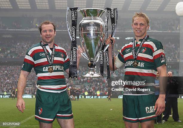 Captain Geordan Murphy and Lewis Moody of Leicester Tigers celebrate with the trophy in the Guinness Premiership Final between Leicester Tigers and...