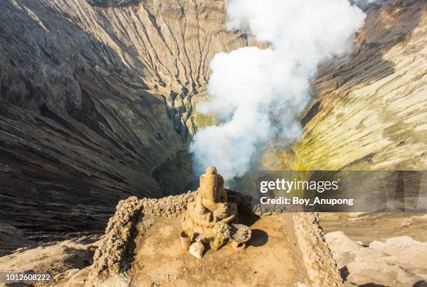 statue of lord ganesha at the bromo volcano crater in east java, indonesia. - ganesha stock pictures, royalty-free photos & images
