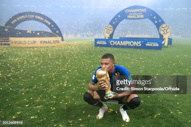 Kylian Mbappe of France kisses the trophy after the 2018 FIFA World Cup Russia Final between France and Croatia at the Luzhniki Stadium on July 15,...