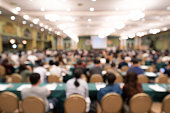 Blurred background of audience in the conference hall or seminar