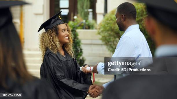 Graduation Received Graduation Ceremony And Receiving Diploma Photos and Premium High Res ...
