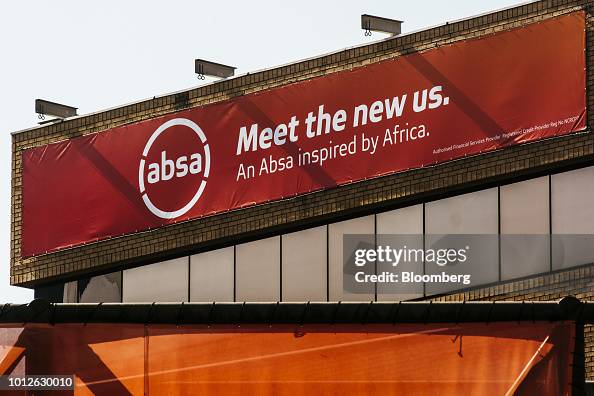 Absa History A new corporate logo sits on a banner displayed at the Absa Group ...