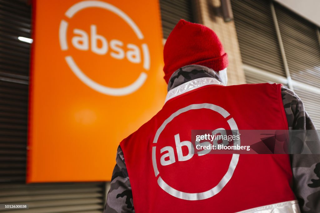 Absa Insurance Company A new corporate logo sits on the branded hi-vis jacket of a security ...