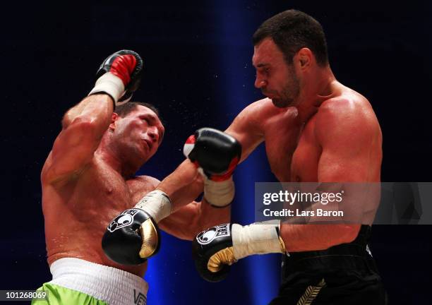 Vitali Klitschko of Ukraine hits Albert Sosnowski of Poland during the WBC Heavyweight World Championship fight between Vitali Klitschko of Ukraine...