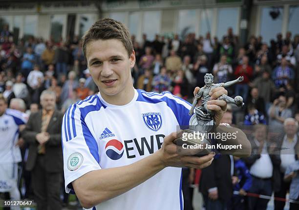 Daniel Frahn of Babelsberg poses with the trophy for best goalgetter after the Regionalliga match between SV Babelsberg and FC St. Pauli II at the...