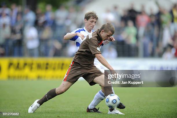 Matthias Rudolph of Babelsberg fights Kristof Kurczynski of St. Pauli during the Regionalliga match between SV Babelsberg and FC St. Pauli II at the...