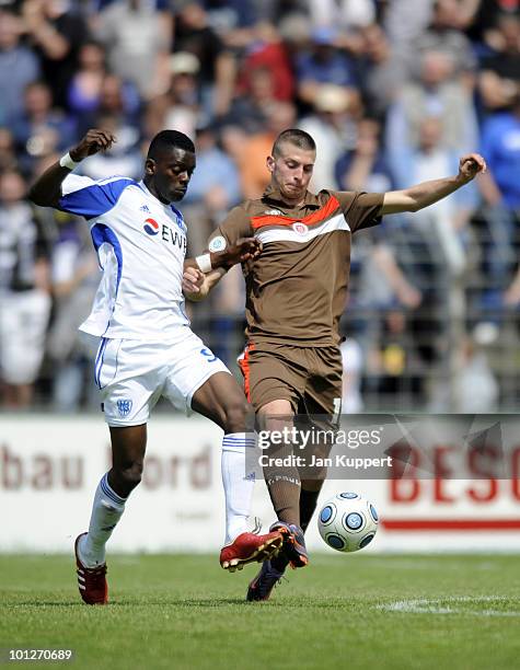 Denis Weidlich of Babelsberg and Petar Filipovic of St.Pauli II challenge for the ball during the Regionalliga match between SV Babelsberg and FC St....