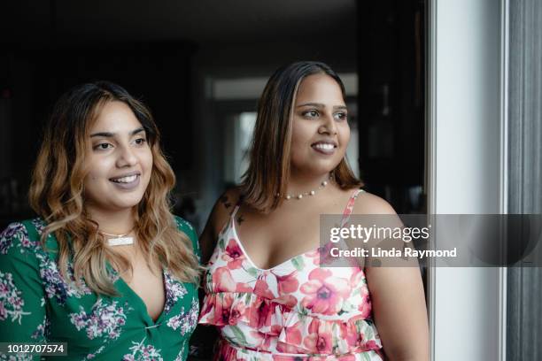 portrait of two indian young woman - sikhism stock pictures, royalty-free photos & images