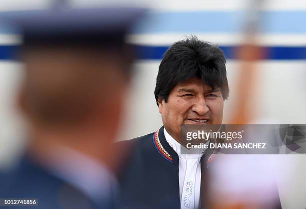 Bolivian President Evo Morales arrives on August 7, 2018 at the CATAM military airport in Bogota, where he will attend Colombia's President Ivan...