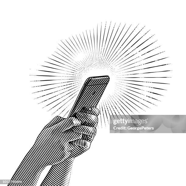 bildbanksillustrationer, clip art samt tecknat material och ikoner med närbild på händer som håller smart telefon - engraving