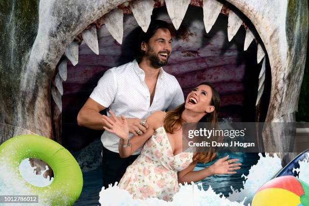 Jamie Jewitt and Camilla Thurlow attend a special screening of 'The Meg' at Brockwell Lido on August 7, 2018 in London, England.