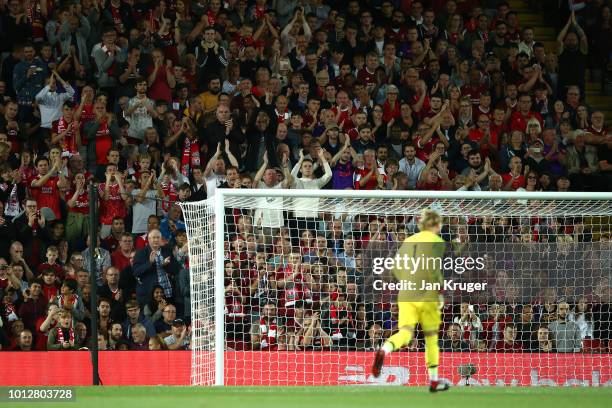 Fans cheer Loris Karius of Liverpool as he replaces Alisson Becker during the pre-season friendly match between Liverpool and Torino at Anfield on...