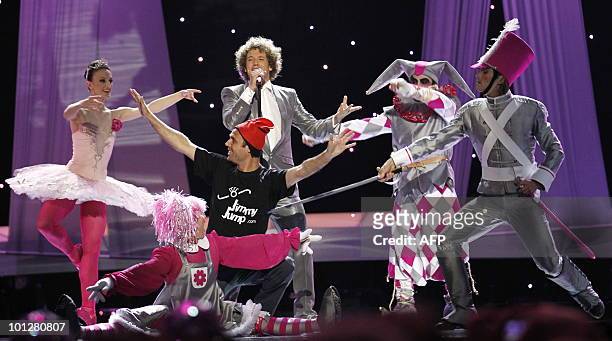 Streaker appears on stage as Spain's Daniel Diges performs his song "Algo Pequeñito " during the Eurovision Song Contest 2010 final at the Telenor...
