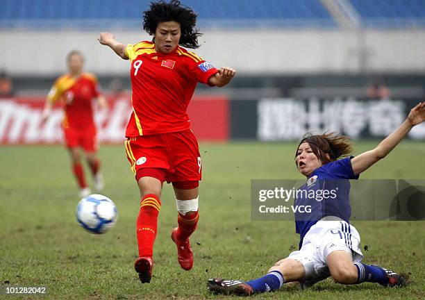 Han Duan of China runs a ball during the AFC Women's Asian Cup Final between China and Japan at Chengdu Sports Center on May 30, 2010 in Chengsu,...