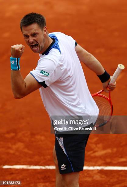 Robin Soderling of Sweden celebrates match point during the men's singles fourth round match between Robin Soderling of Sweden and Marin Cilic of...