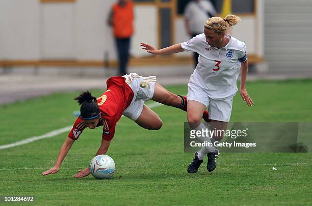 Hasret Kayikci of Germany fights for the ball with Gilly Flaherty of England during the UEFA Women's Under-19 European Championship group A match...