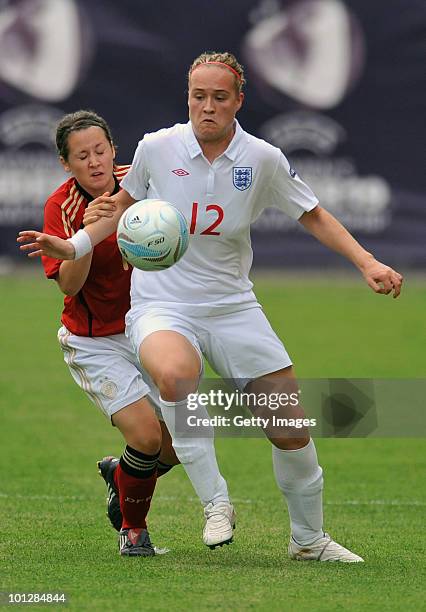 Nicole Rolser of Germany fights for the ball with Lucia Bronze of England during the UEFA Women's Under-19 European Championship group A match...
