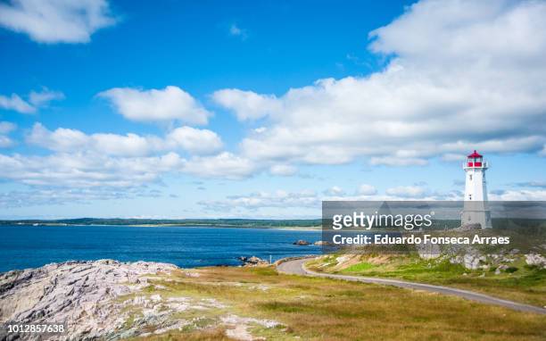 the atlantic coast of canada - the louisbourg lighthouse - cape breton island stockfoto's en -beelden
