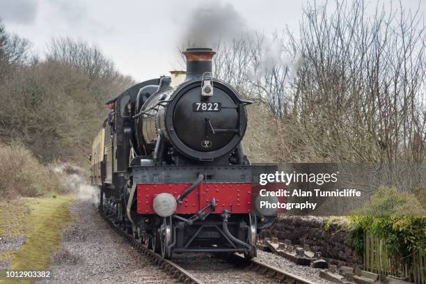 steam locomotive approaching station - history and progress of the steam engine stock pictures, royalty-free photos & images