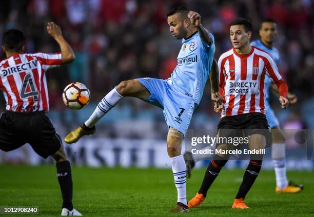 Luan of Gremio kicks the ball during a round of sixteen first leg match between Estudiantes de La Plata and Gremio as part of Copa CONMEBOL...