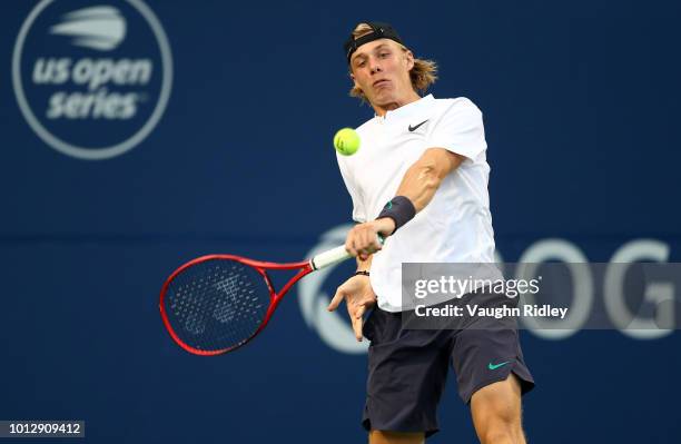 Denis Shapovalov of Canada plays a shot against Jeremy Chardy of France during a 1st round match on Day 2 of the Rogers Cup at Aviva Centre on August...