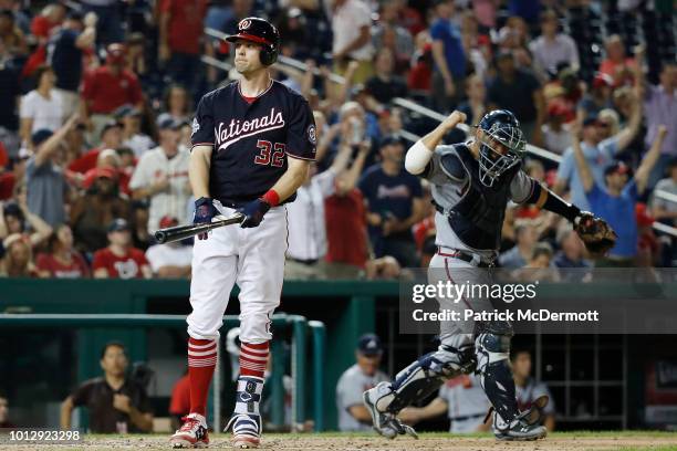 Matt Wieters of the Washington Nationals reacts after lining into a double play in the ninth inning against the Atlanta Braves during game two of a...