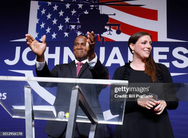 John James, Michigan GOP Senate candidate, celebrates with his wife Elizabeth at an election night event after winning his primary election at his...