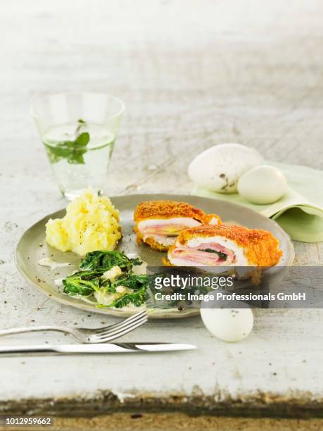 lemon and sage cordon bleu with spinach and mashed potatoes for easter - cordon bleu stock pictures, royalty-free photos & images