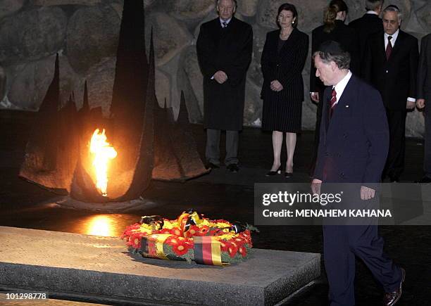 German President Horst Koehler lays a wreath at Jerusalem's Yad Vashem Holocaust memorial 01 February 2005, on the first day of a controversial...