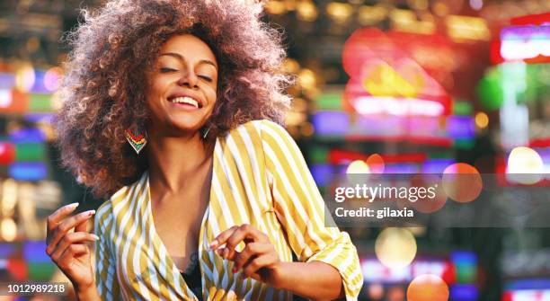 black woman dancing at a concert. - day stock pictures, royalty-free photos & images