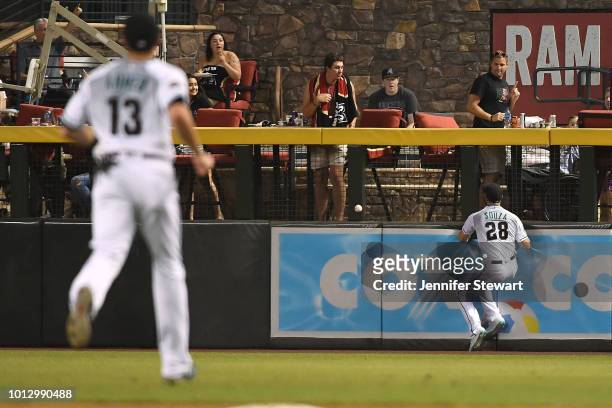 Steven Souza Jr. #28 of the Arizona Diamondbacks is unable to make the catch in the eighth inning of the MLB game against the Philadelphia Phillies...