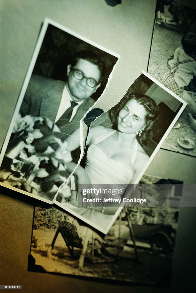 PHOTO OF COUPLE TORN IN HALF, DIVORCE