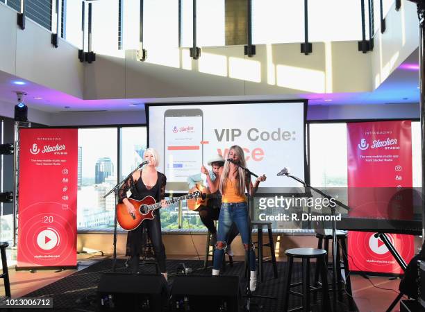 Ashlee Hewitt and Whitney Duncan of Post Monroe perform during Change the Conversation - Slacker Radio #WCE: Country Launch Party at The Steps at WME...