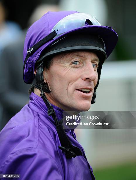 Jockey Kieren Fallon smiles after riding his third winner of the day at Goodwood racecourse on May 31, 2010 in Chichester, England