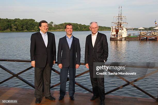 Commission President Jose Manuel Barroso, Russian President Dmitry Medvedev and EU President, Belgian Prime Minister Herman van Rompuy pose prior to...