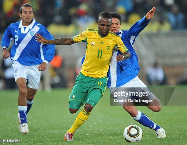 Teko Modise of South Africa is challenged by Carlos Galledo of Guatamala during the International Friendly match between South Africa and Guatemala...