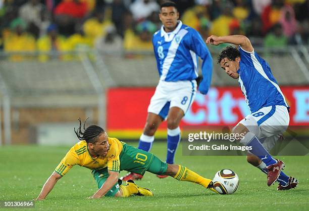 Steven Pienaar of South Africa loses the ball to Sergio Guevara of Guatamala during the International Friendly match between South Africa and...