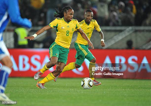 Siphiwe Tshabalala and Teko Modise of South Africa move the ball during the International Friendly match between South Africa and Guatemala at the...