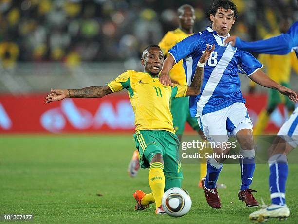 Teko Modise of South Africa is challenged by Sergio Guevara of Guatamala during the International Friendly match between South Africa and Guatemala...