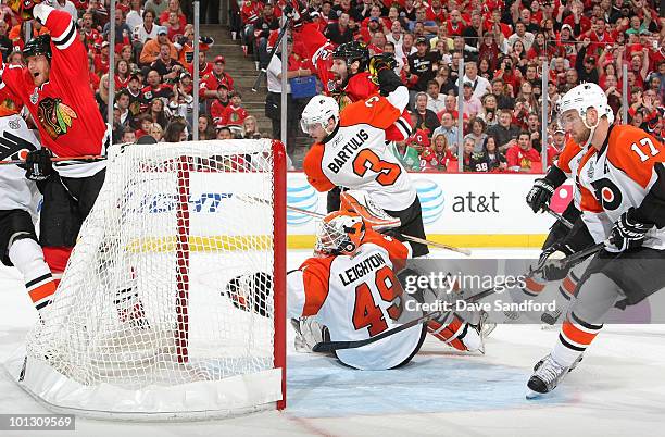 Marian Hossa of the Chicago Blackhawks scores on goaltender Michael Leighton of the Philadelphia Flyers during the second period of Game Two of the...