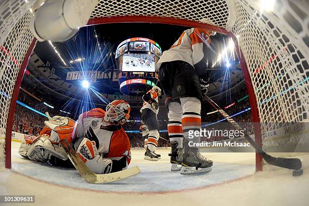 Michael Leighton of the Philadelphia Flyers lays on the ice after allowing a second period goal to Marian Hossa of Chicago Blackhawks in Game Two of...