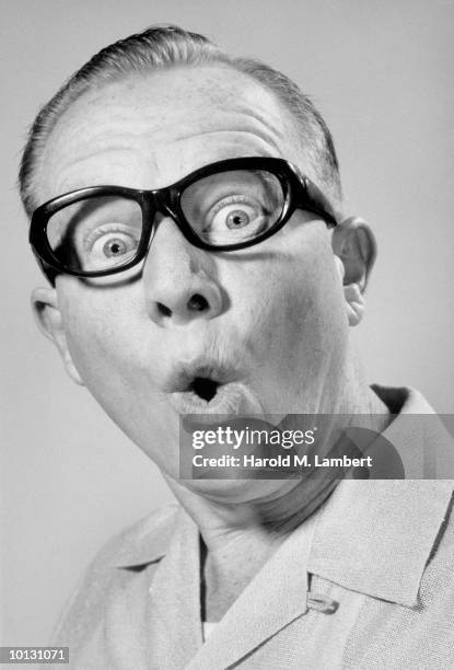 MAN WITH THICK GLASSES SURPRISED, 1965