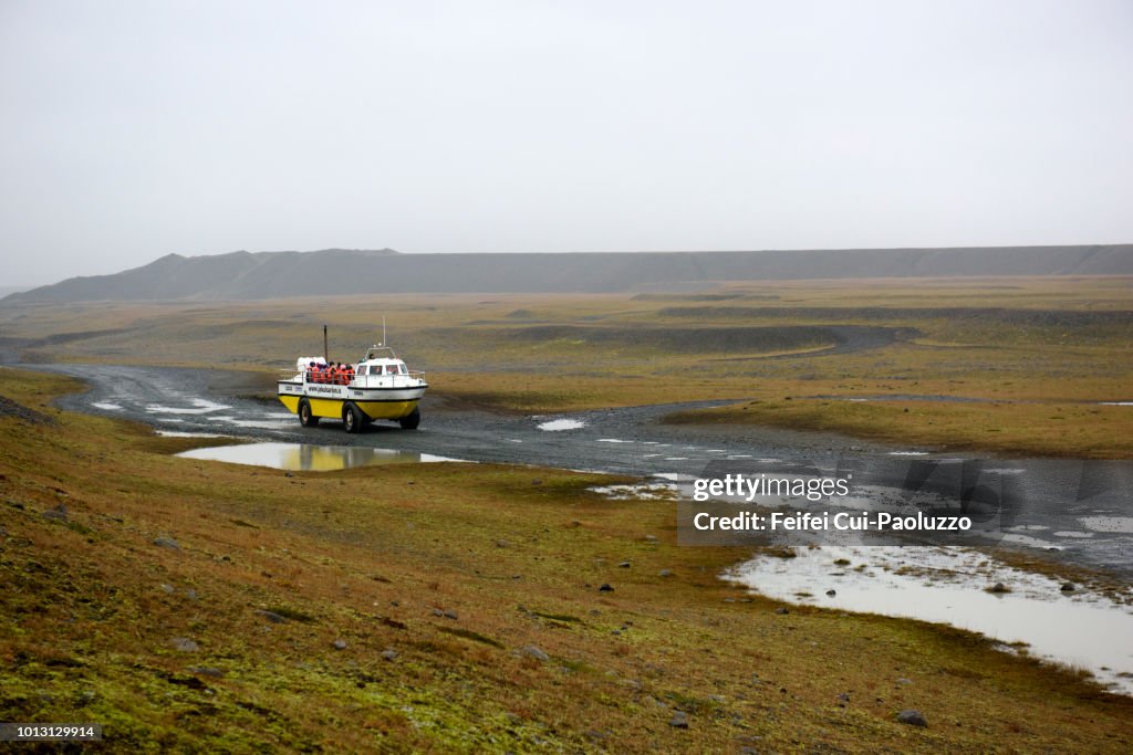 Amphibious vehicle and a group of tourists visiting Jokulsarlon lagoon, Eastern Iceland