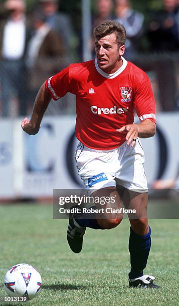 Mark Racker#3 for Sysney United looks to get the ball away,during round five of the National Soccer League in the match between Melbourne Knights and...