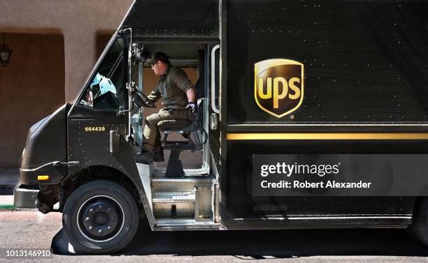 Truck driver makes a delivery in Santa Fe, New Mexico.