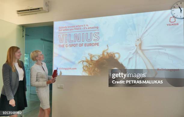 Inga Romanovskiene, director of official tourism service Go Vilnius and Indre Speciunaite public relations project manager pose in front of a...