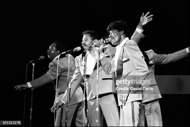 Melvin Franklin, Ron Tyson and Ali-Ollie Woodson of The Temptations perform on stage at Hammersmith Odeon on 17th April 1986 in London.