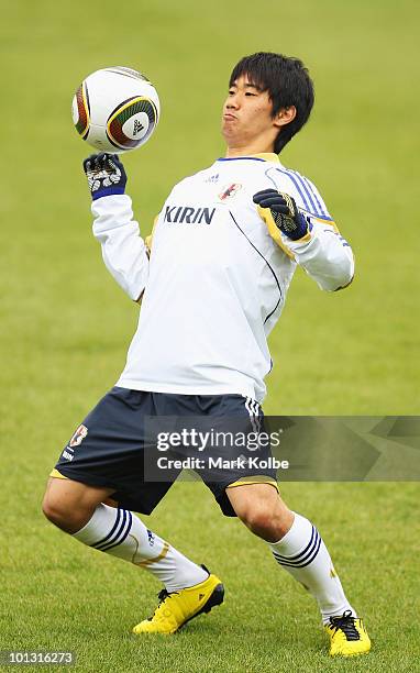 Shinji Kagawa controls the ball during a Japan training session at Saas-Fee Stadium on June 1, 2010 in Saas-Fee, Switzerland.