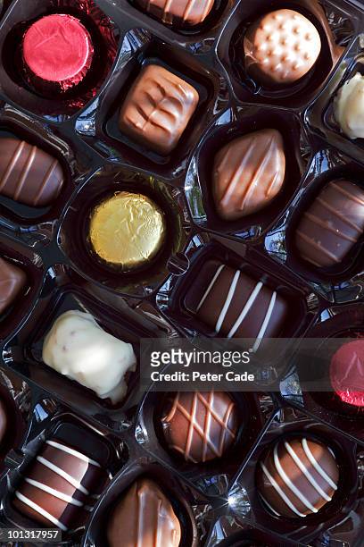 chocolates - box of chocolate stockfoto's en -beelden
