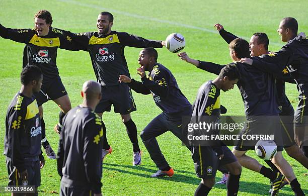 Brazil national team player Robinho reacts with teammates during a training session on June 1, 2010 in Johannesburg ahead of the FIFA 2010 World Cup...